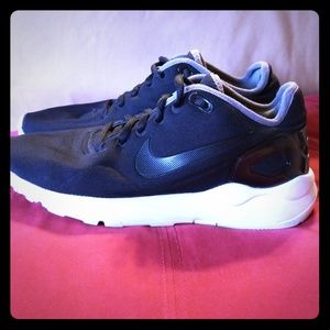 Black Nike tennis shoe.  Gently worn see picture